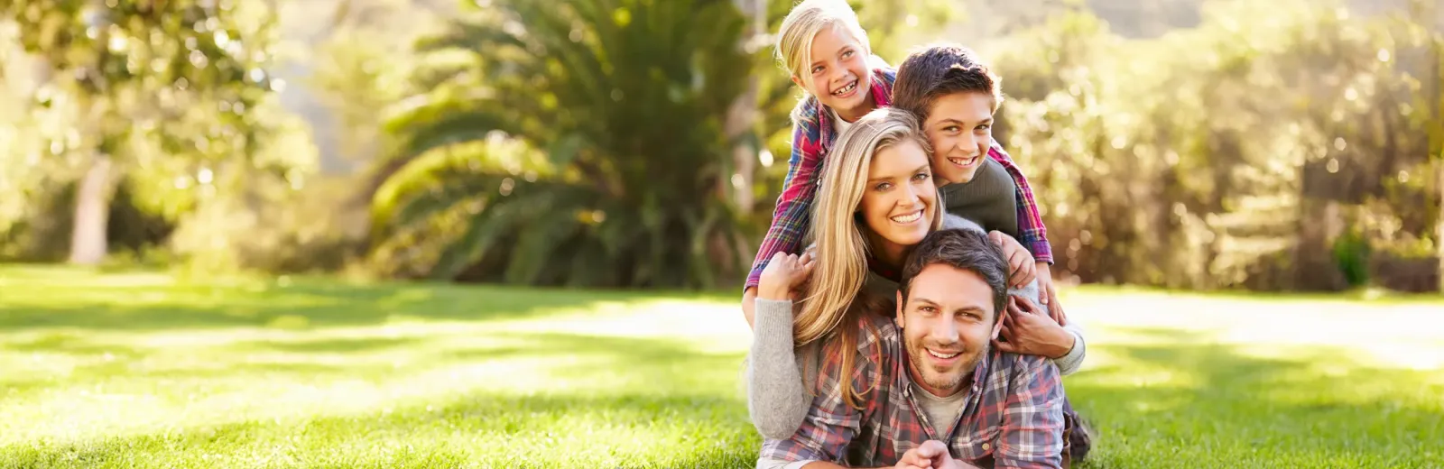Family playing outside on a nice sunny day