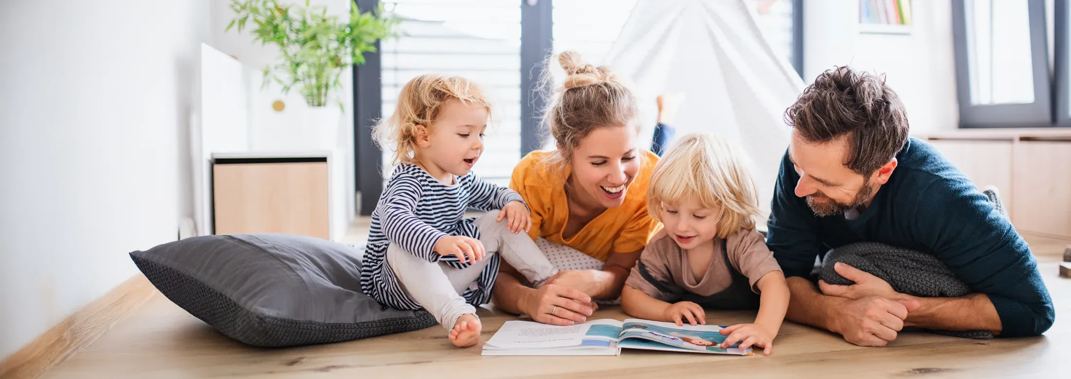 family reading a book in a pest free home