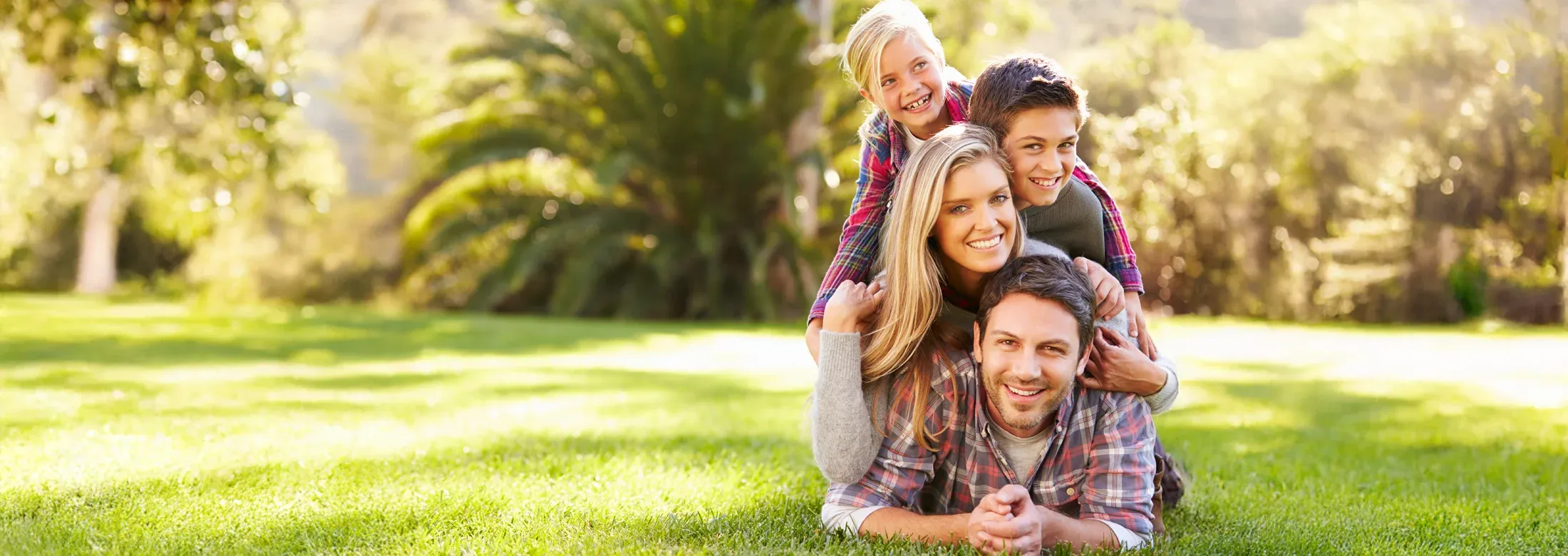 Family playing outside on a nice sunny day